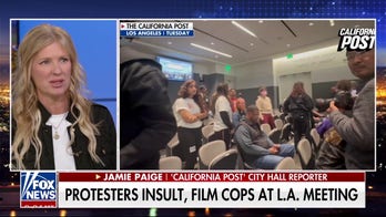 Protesters insult, film law enforcement at an LAPD commission meeting