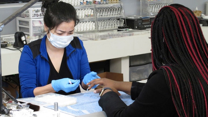 Media blast Georgia for reopening