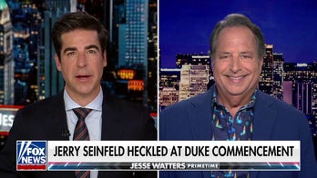 What do these student protesters achieve by walking out of their graduation?: Jon Lovitz