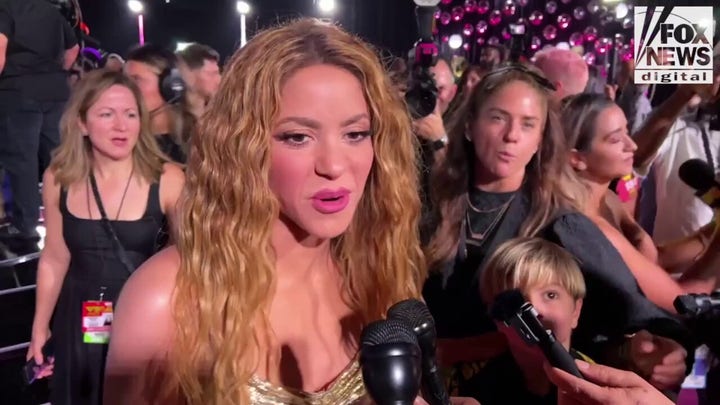 Shakira talks fashion on the MTV VMAs red carpet