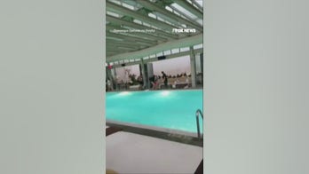 Coolers, cushions sent FLYING as severe storm slams NYC rooftop pool