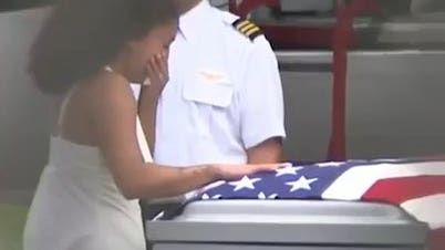 Family mourns fallen soldier after receiving flag-draped casket