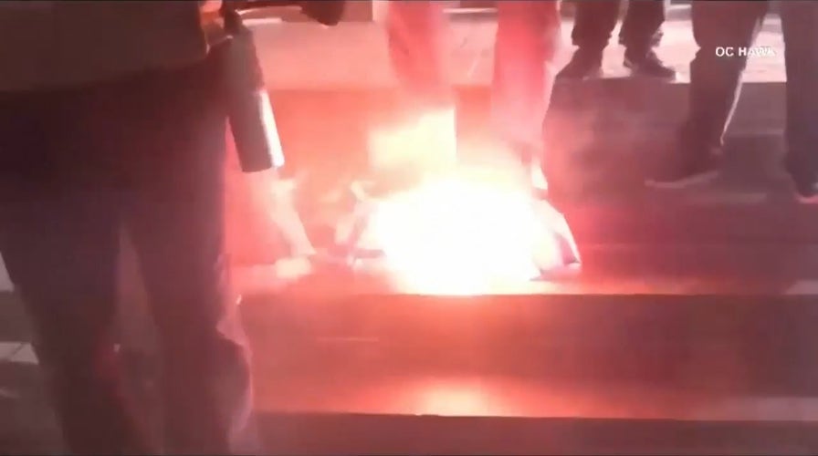 Anti-ICE agitators burn American flag outside California federal building