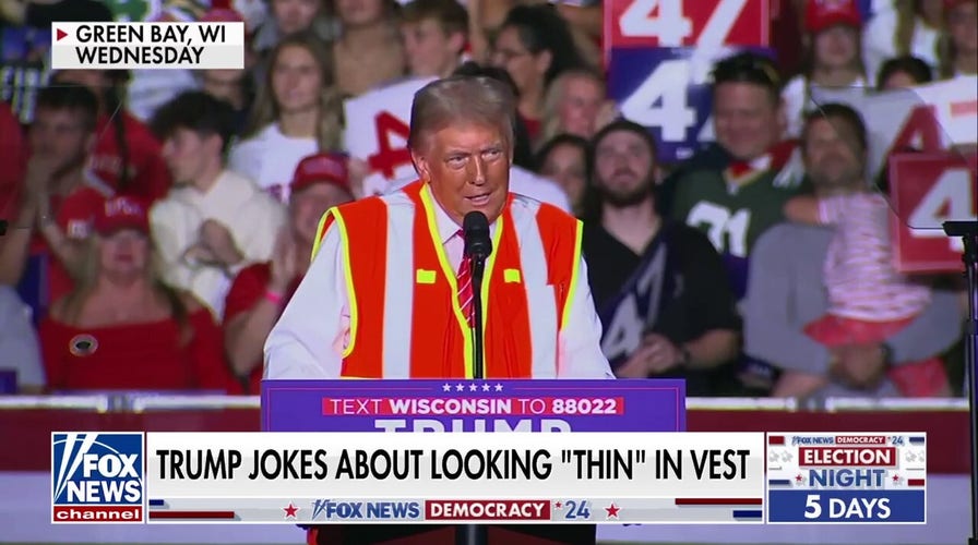 Trump capitalizes on Bidens garbage remark by wearing sanitation vest