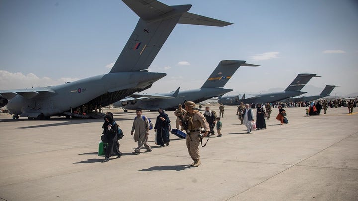 Afghanistan evacuation intensifies as Taliban sends message to Biden
