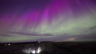 Aurora borealis lights up evening sky in this stunning video - Fox News