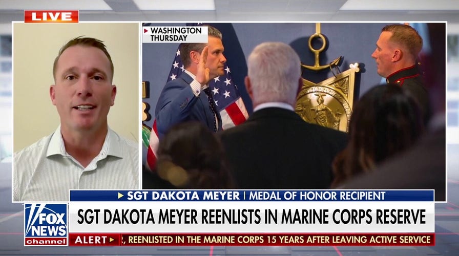Medal of Honor recipient re-enlists in Marine reserves