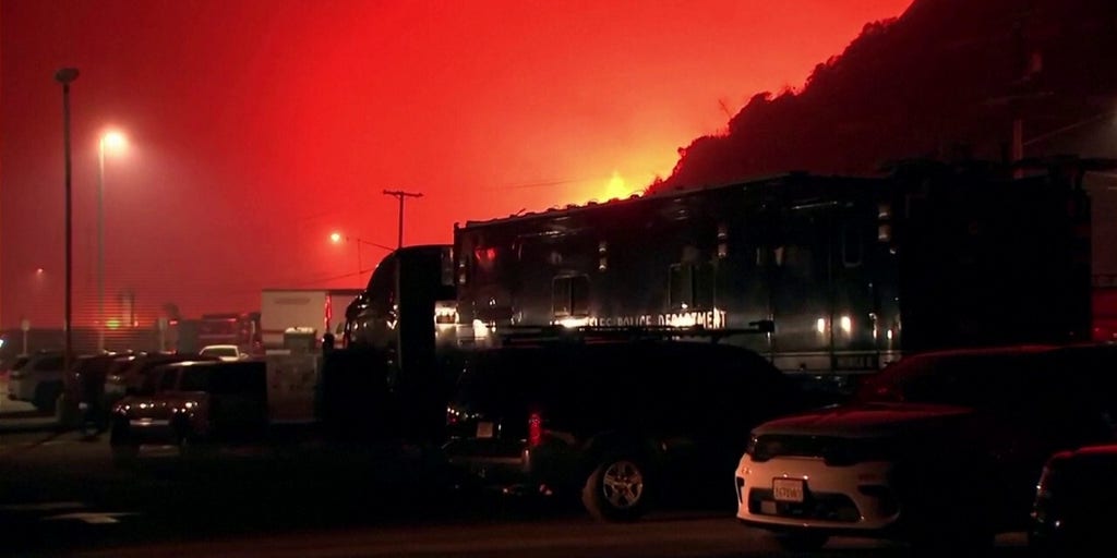 Wildfire rages in Los Angeles amid strong winds
