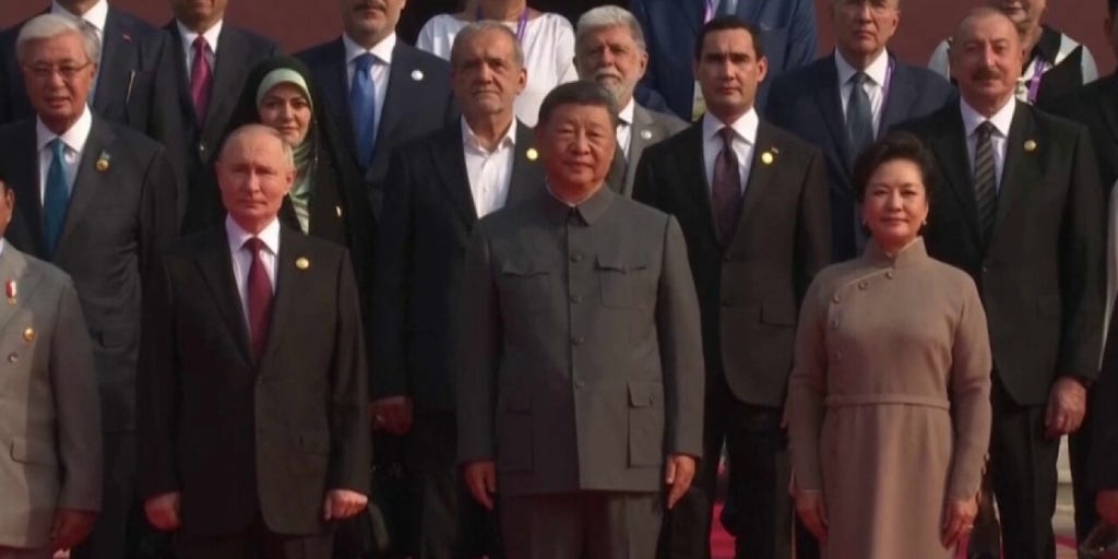 Xi, Putin caught in hot mic moment in Beijing