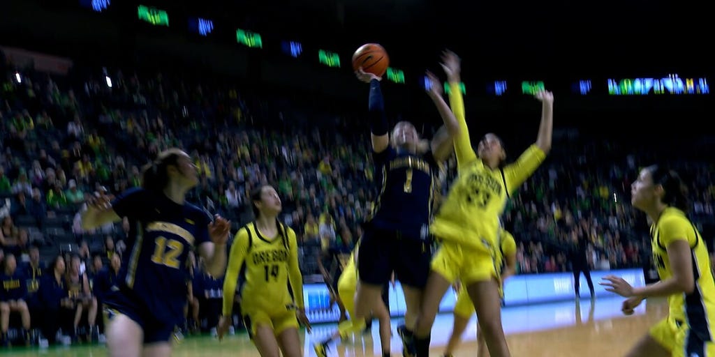 Michigan's Olivia Olson drives right for CLUTCH and-one finish, sending game to double overtime against Oregon