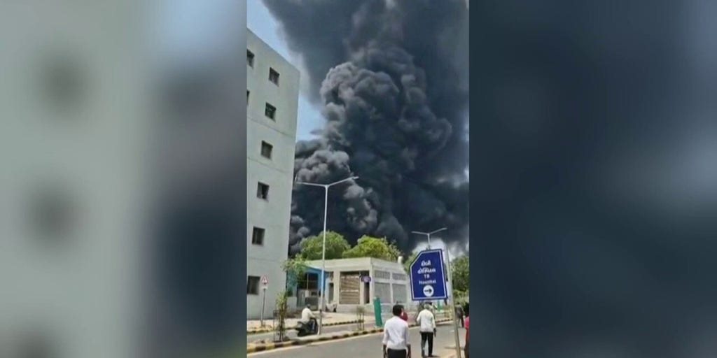 Smoke rises after Air India plane crashes in Ahmedabad