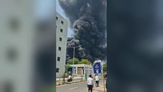 Smoke rises after Air India plane crashes in Ahmedabad