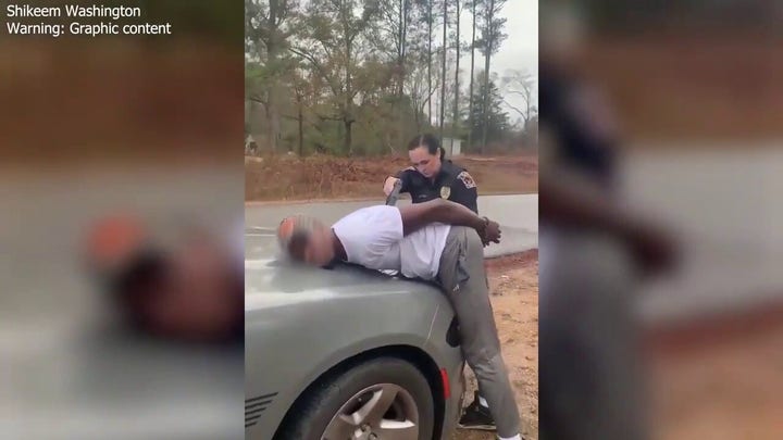 Video shows cop using stun gun on handcuffed man