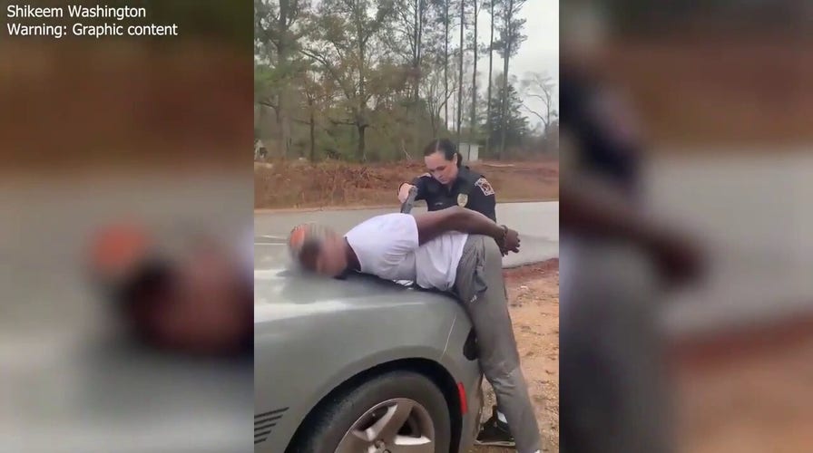 Video shows cop using stun gun on handcuffed man