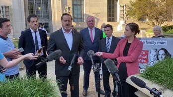 Australian delegation calling on the U.S. to free Julian Assange speaks at a press conference outside the Justice Department