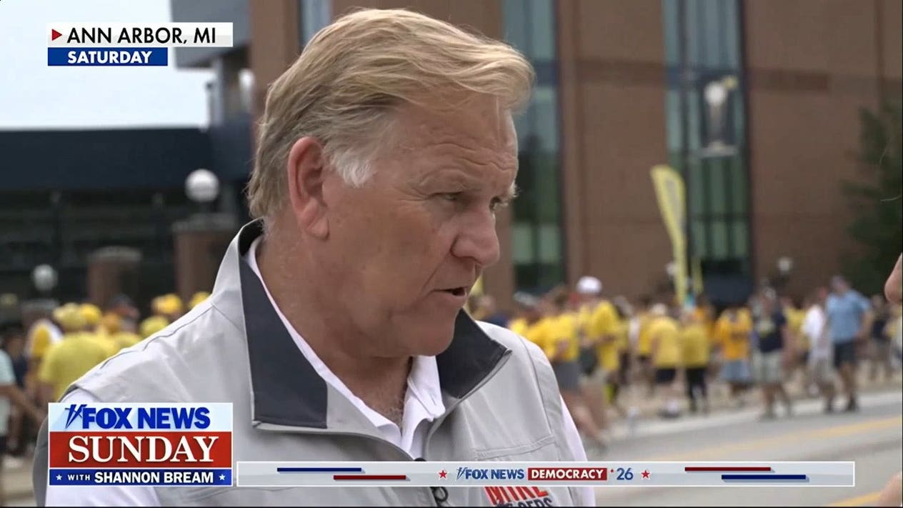 Football and politics merge at Michigan tailgate as Senate candidates mingle with attendees