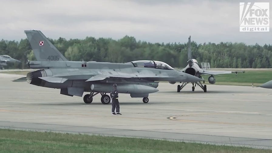 US and Polish pilots stand together on NATO's front line