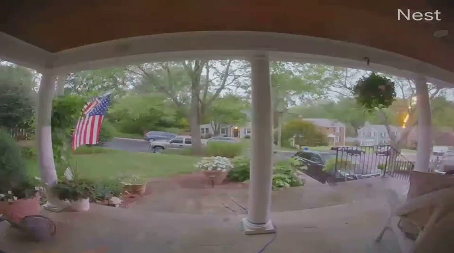 Lightning strike caught on camera in Maryland neighborhood