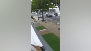 Man PUNCHES woman walking on sidewalk, knocking her to the ground