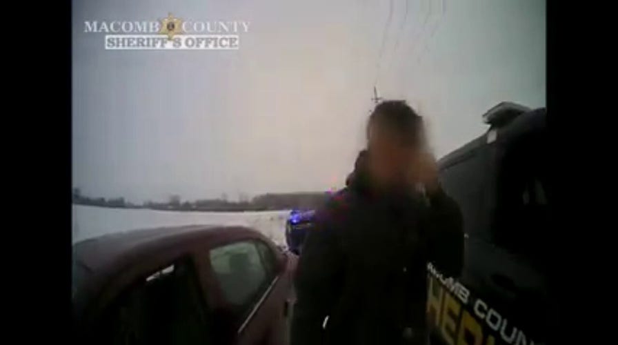 Michigan police shares warm hug with man, offers to get him help