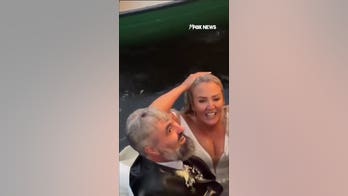 Wedding canoe FAIL leaves bride and groom drenched