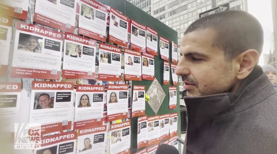 Israeli Michael Levy finds poster of his hostage brother, Or Levy, in NYC