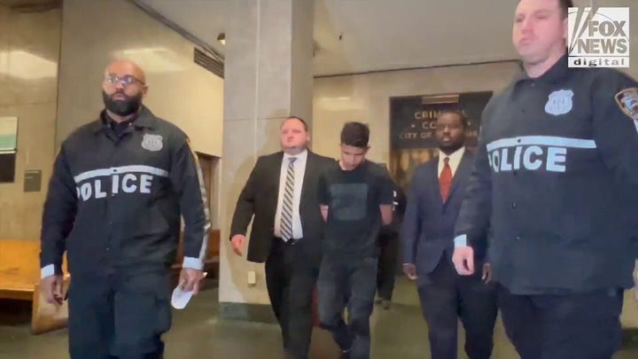 Jesus Alejandro Rivas-Figueroa is escorted out of his arraignment in New York City on Saturday, Feb. 10, 2024