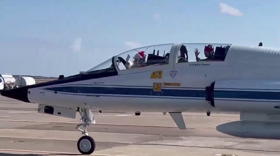 Santa trades sleigh for jet in Texas