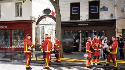Historic food market ravaged by flames as investigators search for cause