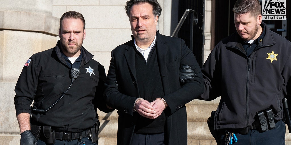 Brian Walshe leaves court after being sentenced to life