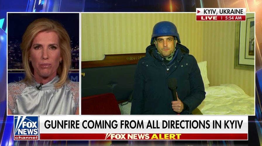 Trey Yingst says 'gunfire' is underway in the streets of Kyiv