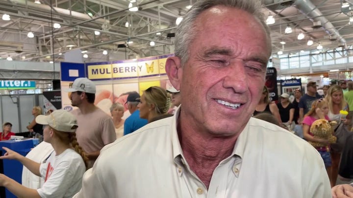 Robert F. Kennedy Jr. says Woody Harrelson ‘kind of off the grid,’ may not know about the controversy over his wearing a hat supporting RFK Jr. for president