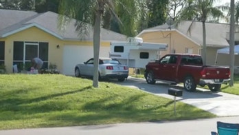 Brian Laundrie's parents feast on Dunkin' while America hunts for their son