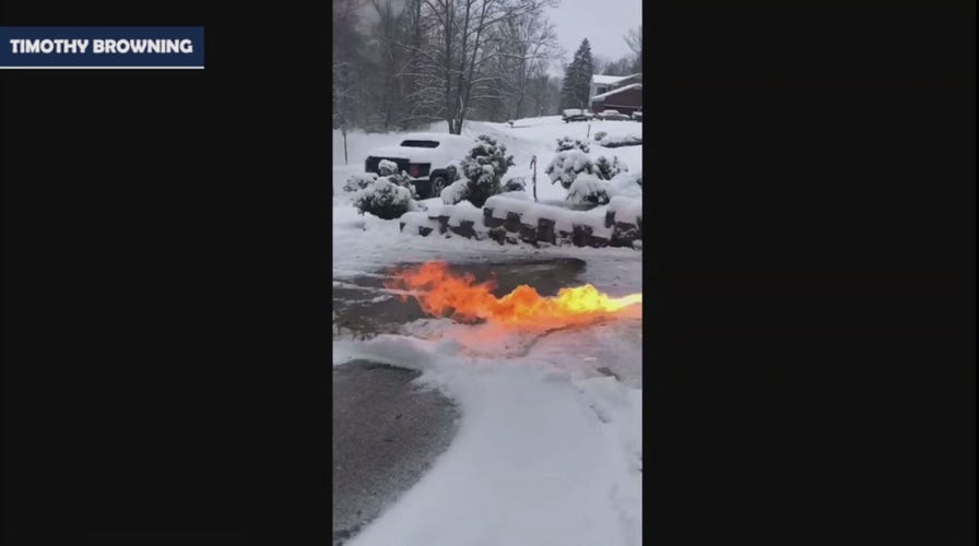 Kentucky man uses flamethrower to clear driveway