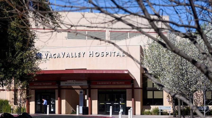 Investigators race to retrace steps of US woman with coronavirus of unknown origin