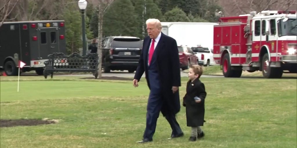 President Donald Trump and Elon Musk's son walk to Marine Force One in heart-warming video