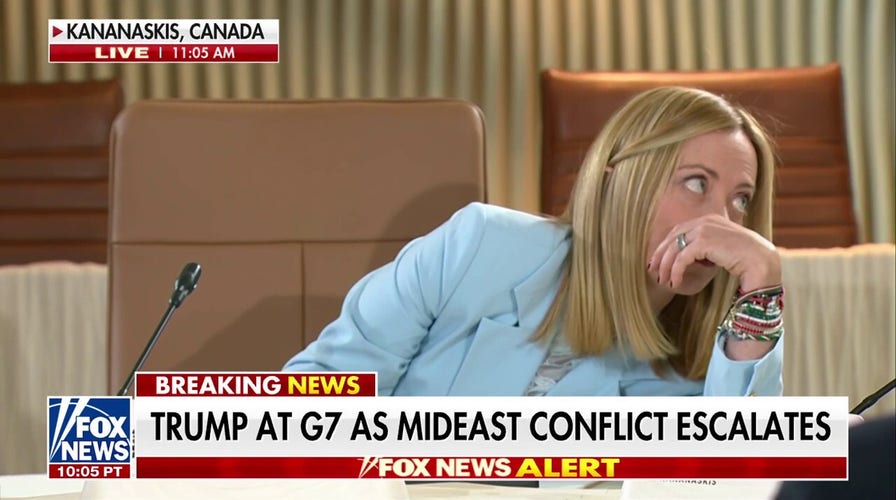 Italian PM Meloni caught rolling her eyes while whispering with Macron