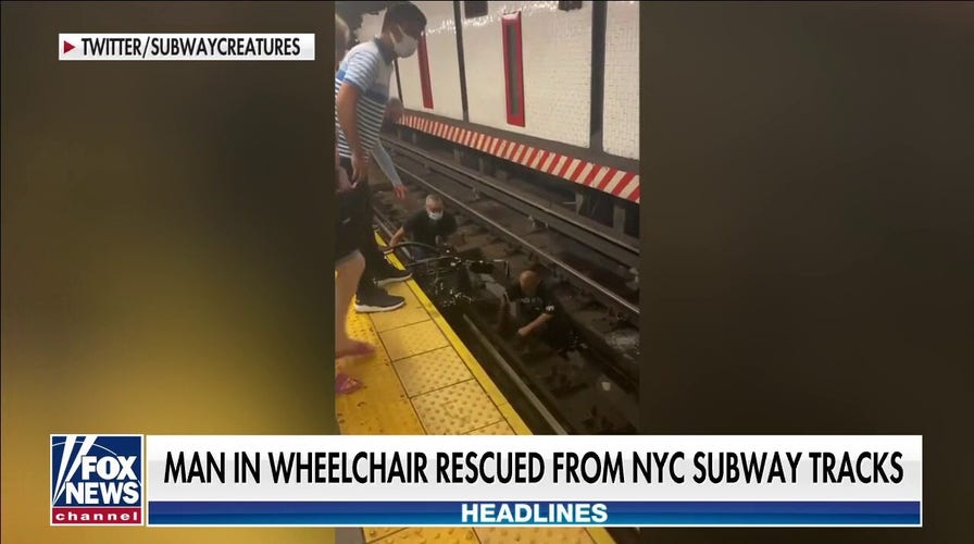 Man in wheelchair rescued from New York City subway tracks