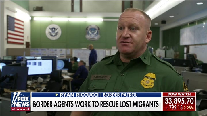 Border Patrol agents work to rescue distressed migrants crossing the desert