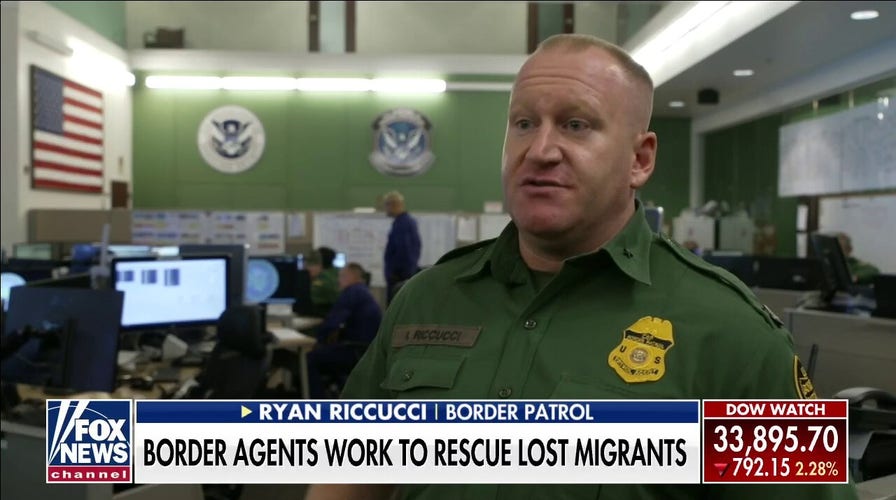 Border Patrol agents work to rescue distressed migrants crossing the desert