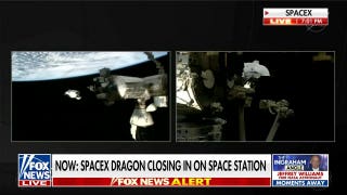SpaceX Dragon capsule docks at the International Space Station