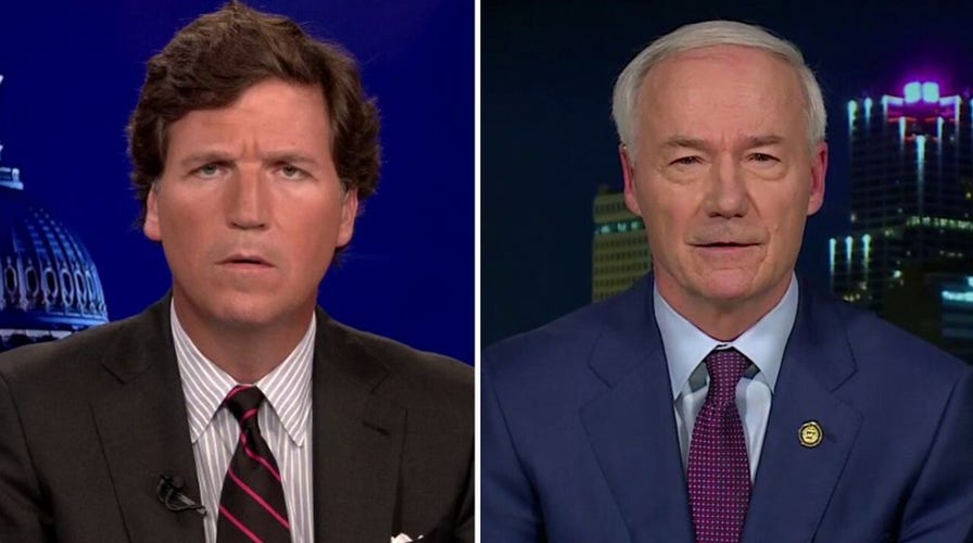 Tucker questions Arkansas governor on 'how deeply' he's studied youth gender reassignment