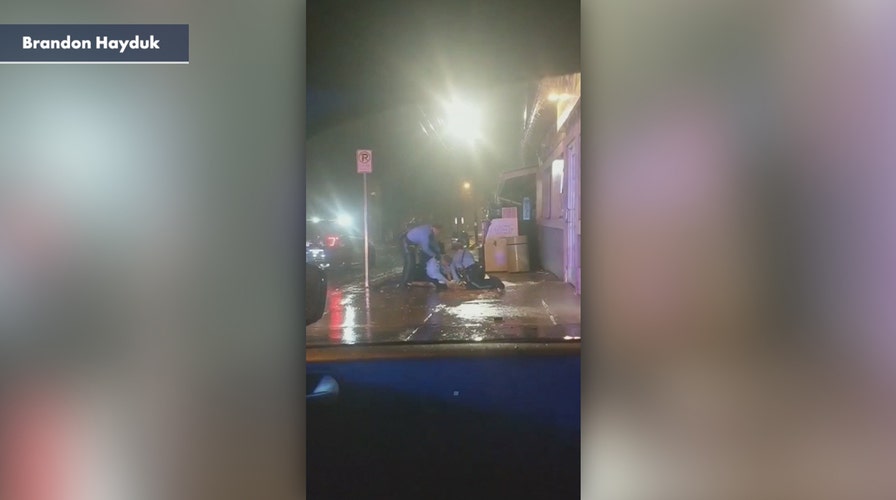 Lansing police officer on leave after arrest video goes viral