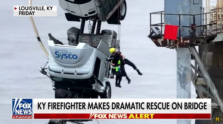 Firefighter who rescued truck driver dangling from bridge speaks out
