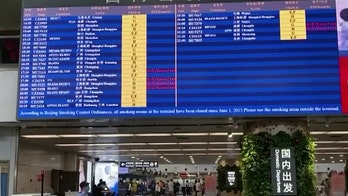 China raises emergency warning level amid new COVID-19 outbreak in Beijing