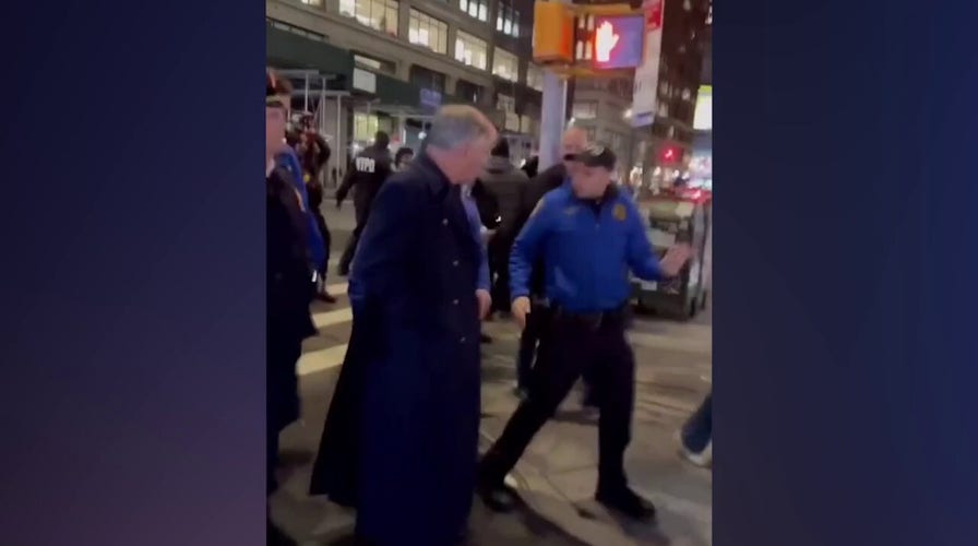 WATCH: Alec Baldwin escorted by police after talking to protesters
