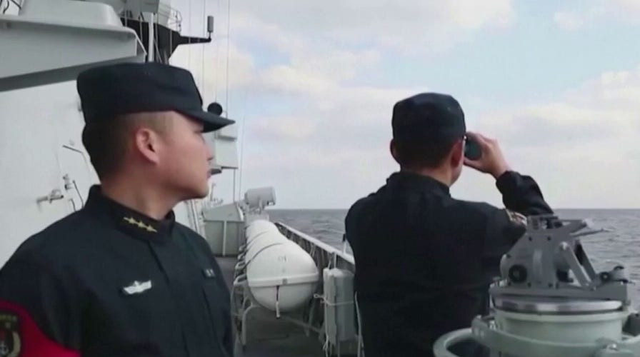 Chinese warplanes and ships move toward Taiwan in display of force