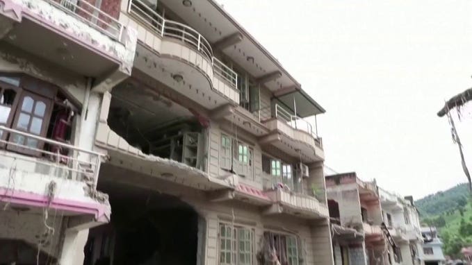 Rescuers in Nepal deploy ziplines to ferry stranded citizens after devastating floods destroyed area bridges