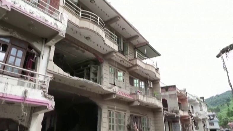 Rescuers in Nepal deploy ziplines to ferry stranded citizens after devastating floods destroyed area bridges