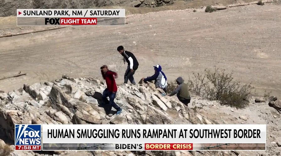Migrants picked up by human smugglers in broad daylight